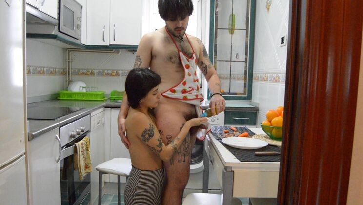 Brunette Plays With Food In Kitchen